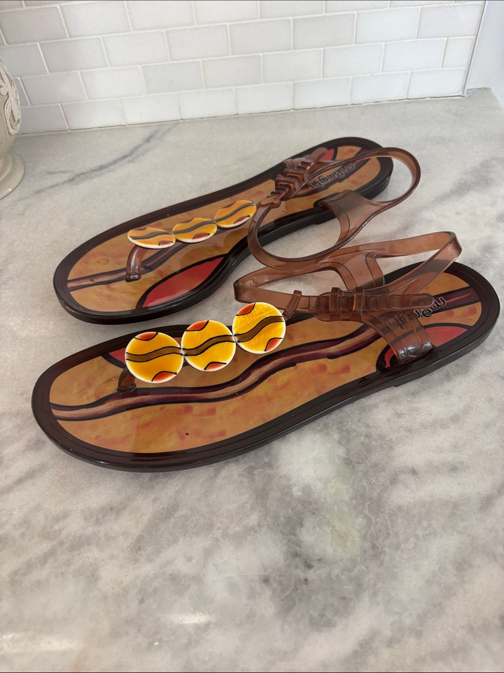 Women’s Brown Jelly T-Strap Sandals with Decorative Accents